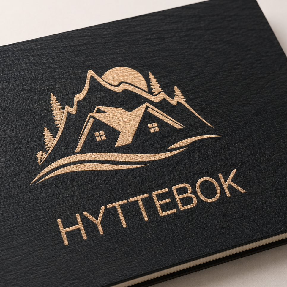 hyttebok svart gravert hyttemotiv