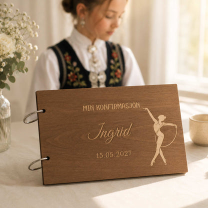 Brun personlig konfirmasjonsbok i tre med gravert gymnastikkmotiv